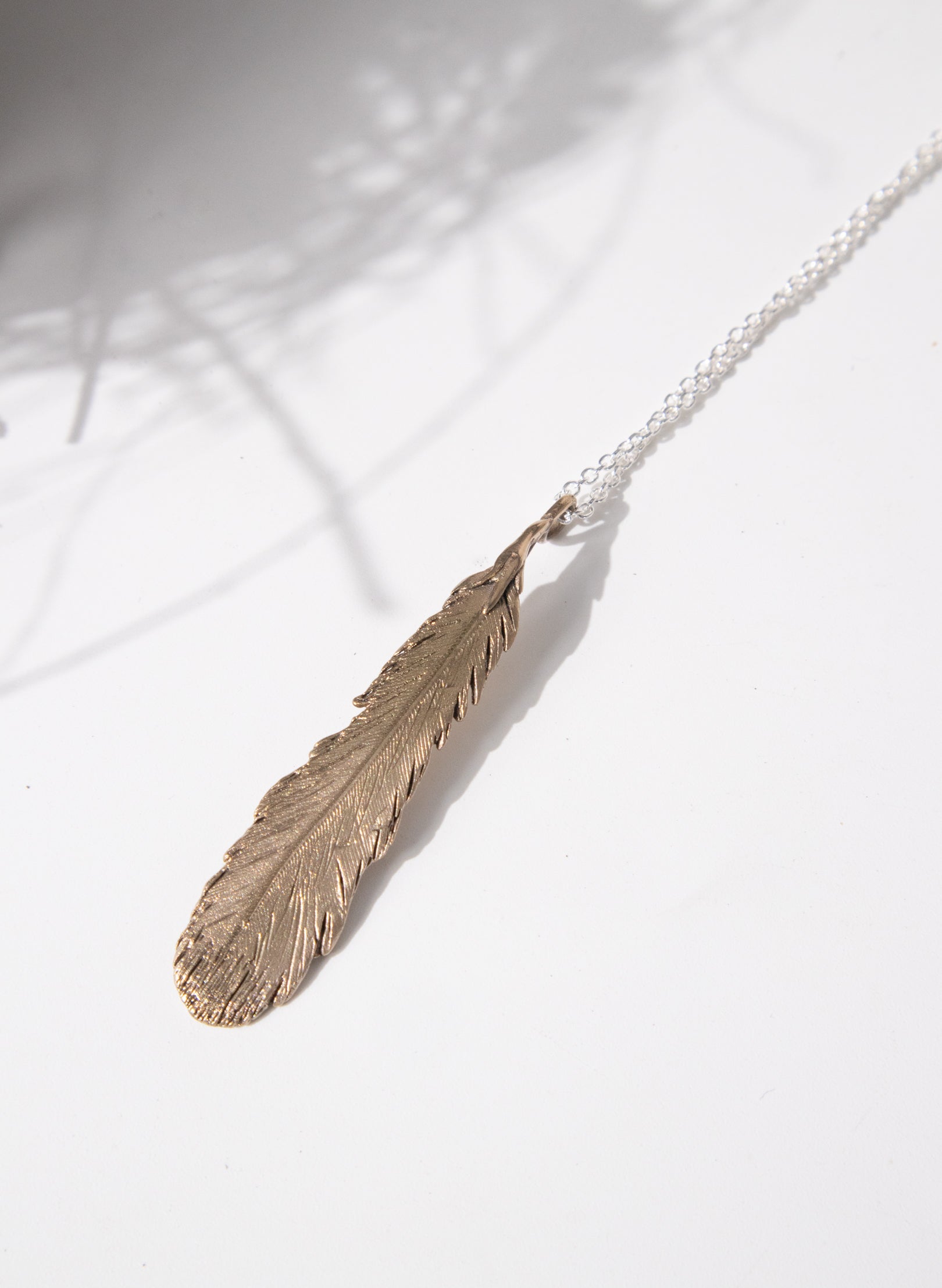 Huia Feather Necklace - Bronze