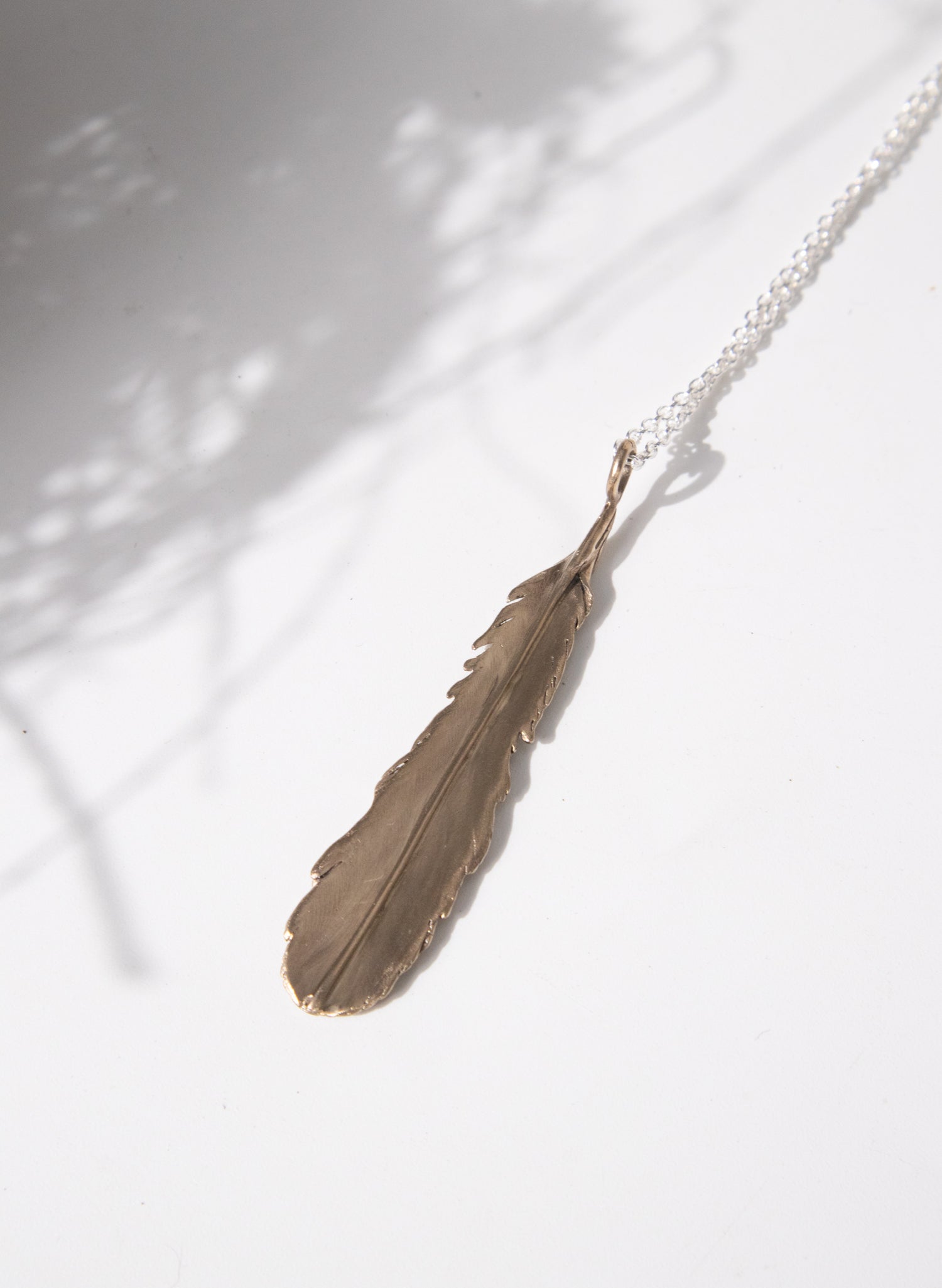 Huia Feather Necklace - Bronze