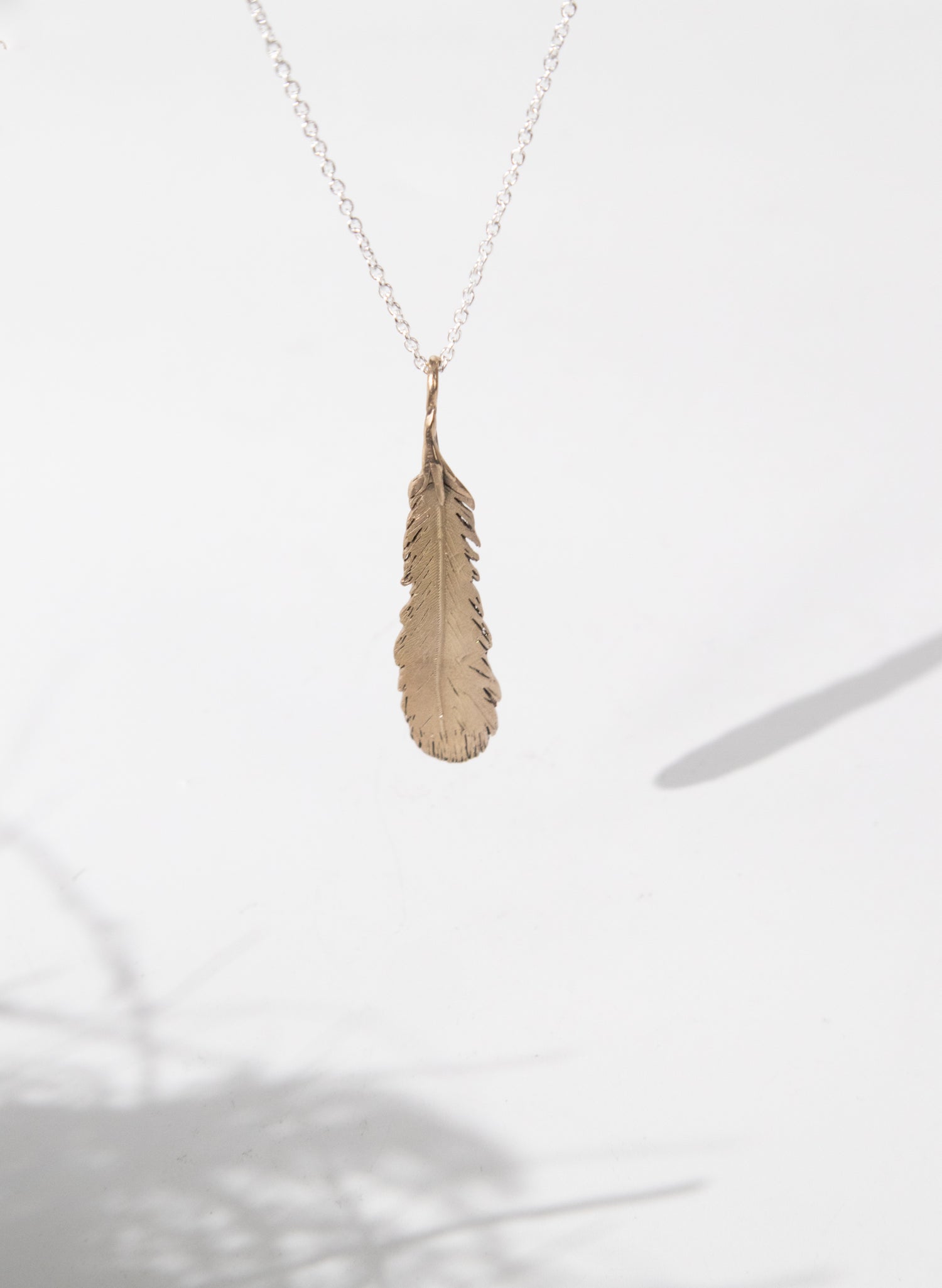 Huia Feather Necklace - Bronze