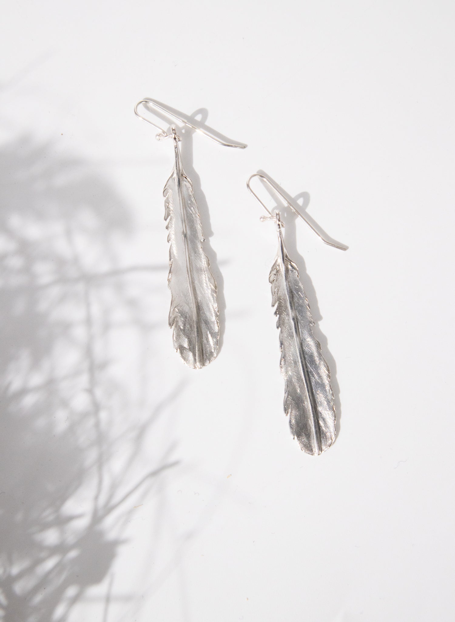 Huia Feather Earrings - Silver