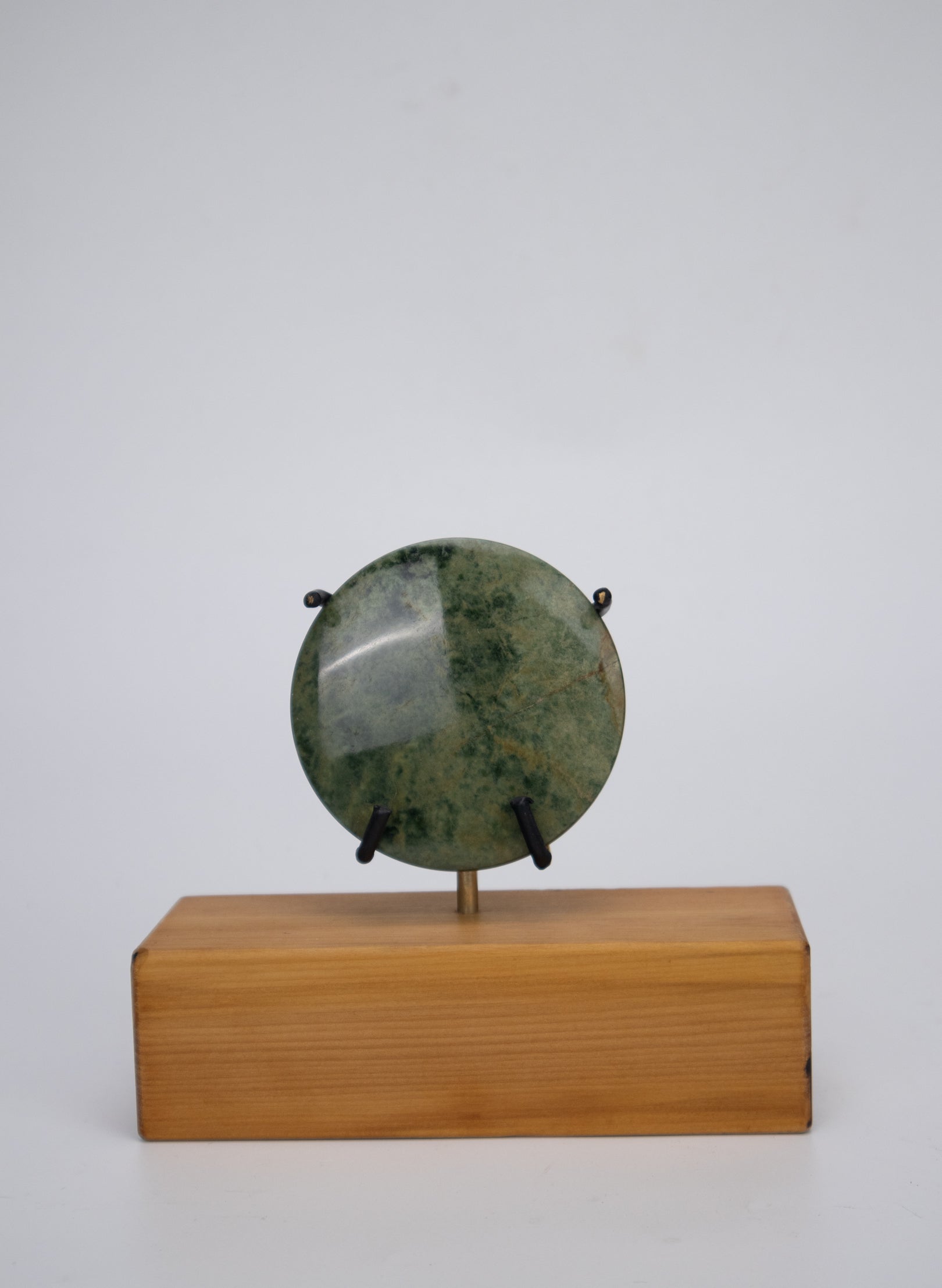 Pounamu Disc on Stand