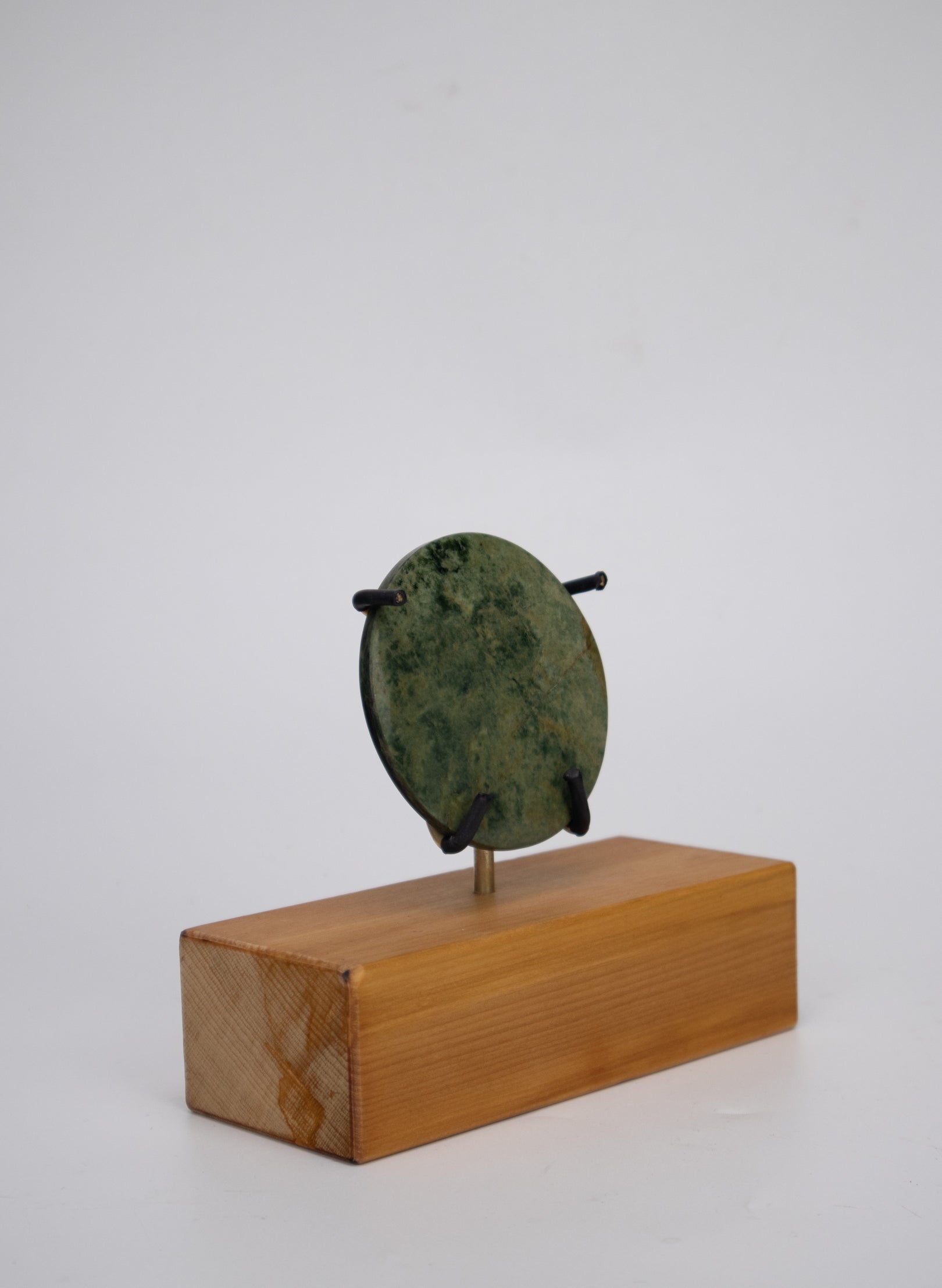 Pounamu Disc on Stand