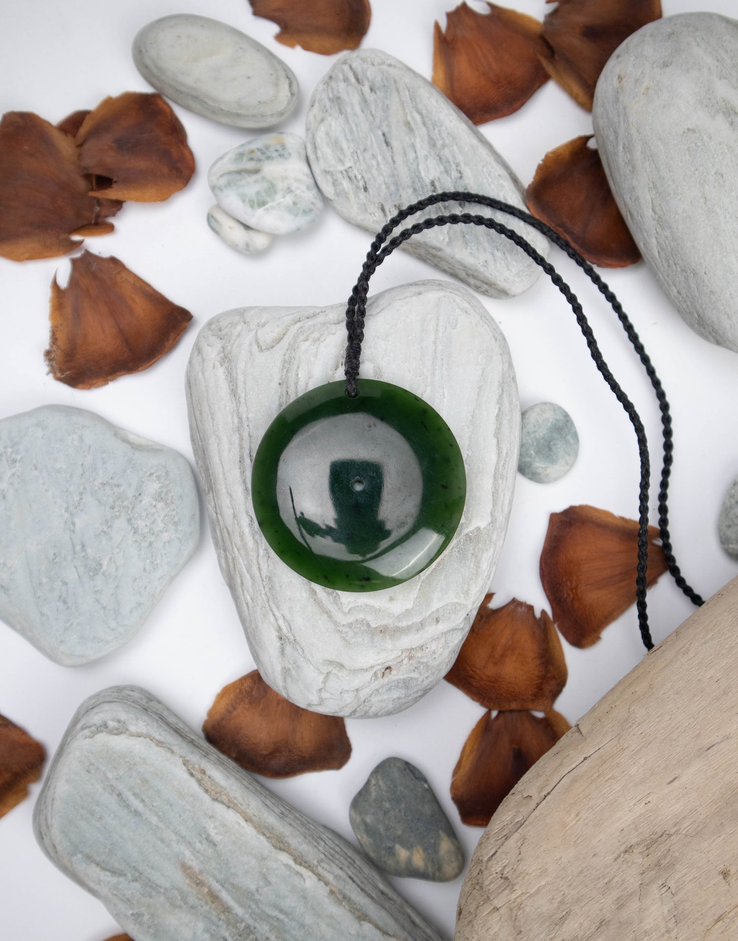 Carved Pounamu Disc Pendant