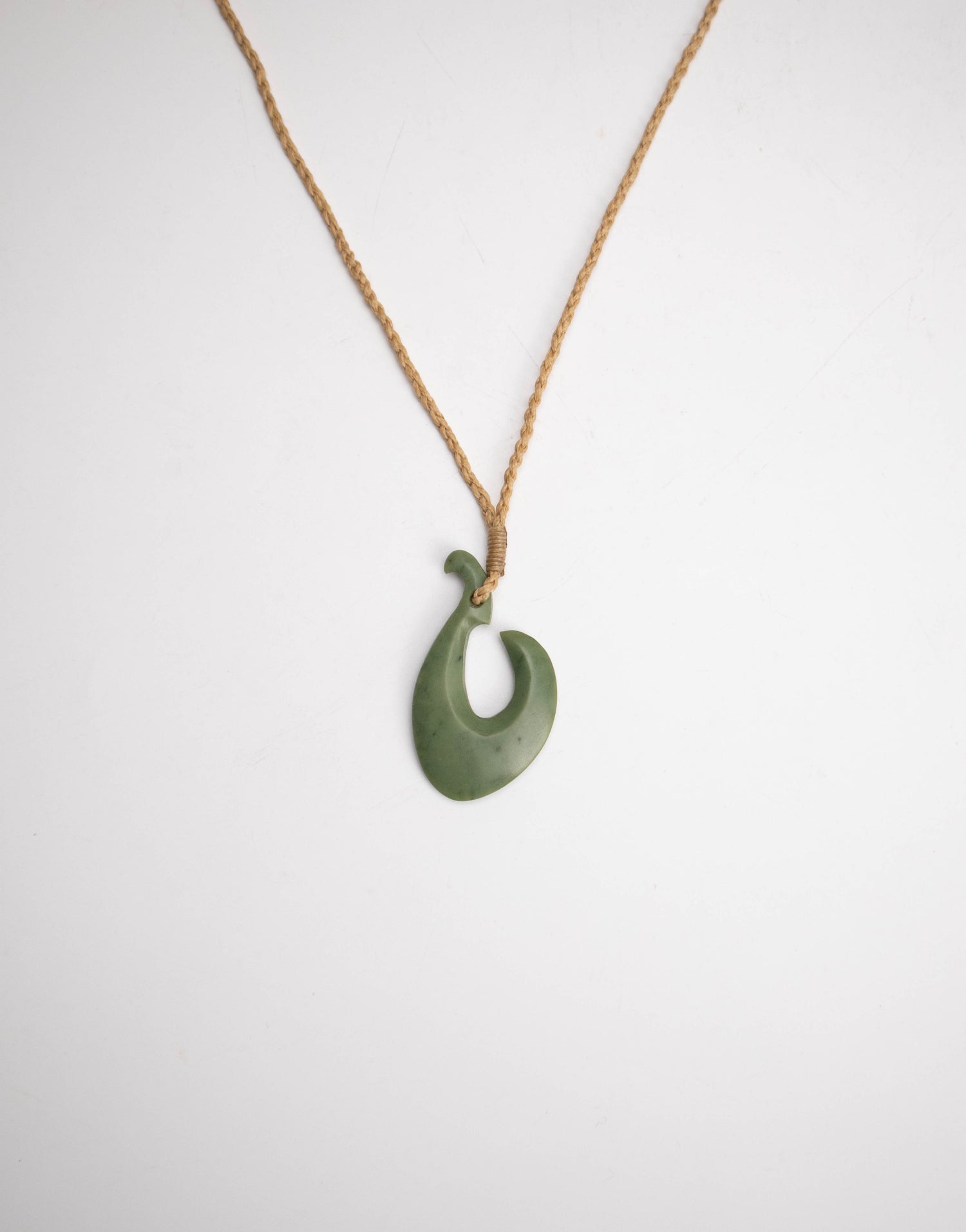 Carved Pounamu Hei Matau Pendant