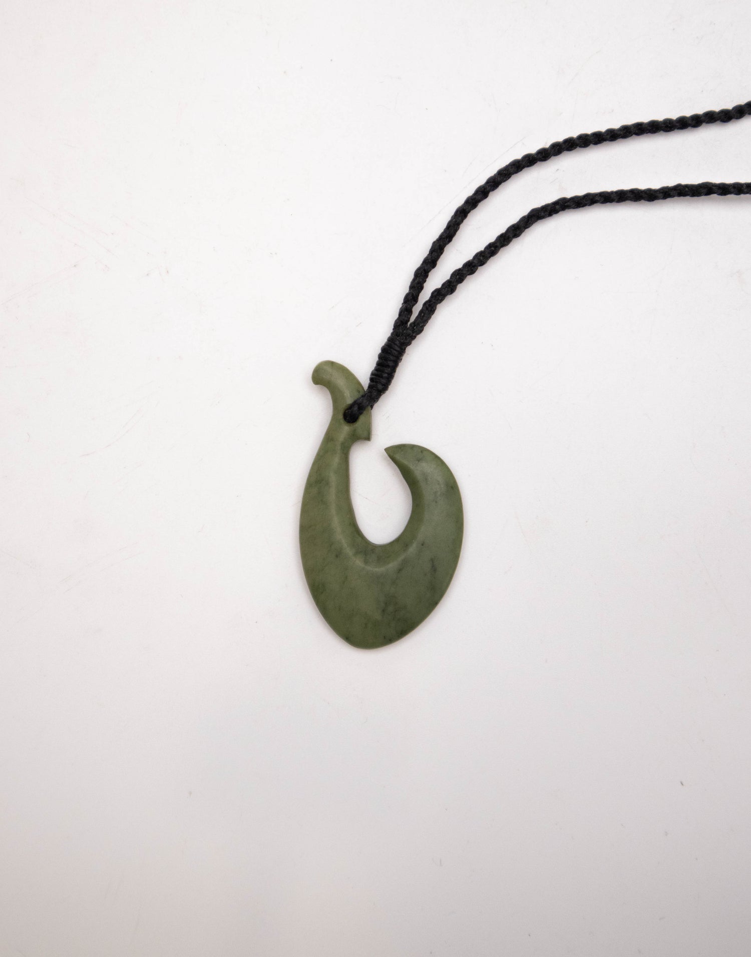 Carved Pounamu Hei Matau Pendant